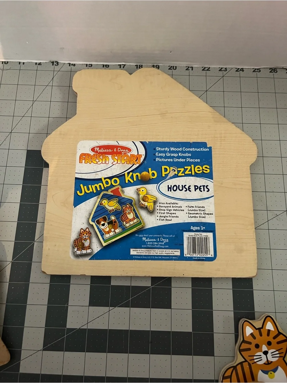 Melissa & Doug Wooden House Peg Puzzle with Blue, Yellow, Brown, Orange